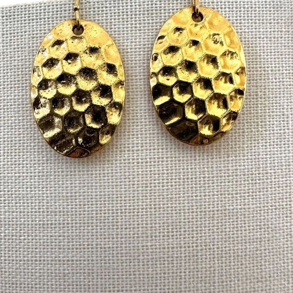 Gold tone hammered oval drop earrings